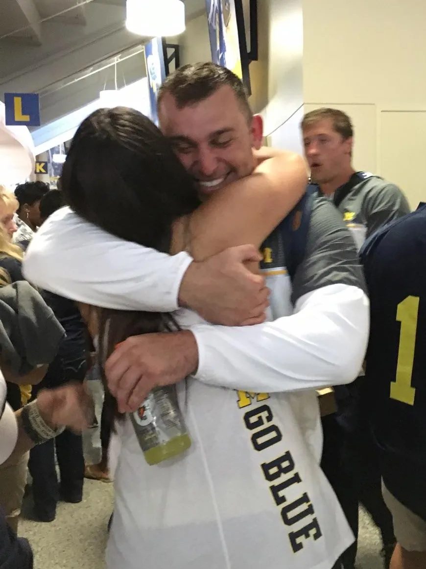 Hirsch in a postgame hug