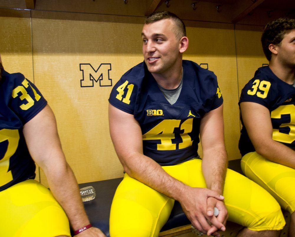 Hirsch in his #41 Michigan jersey on media day